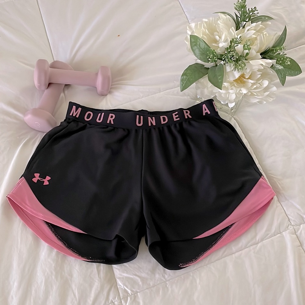 Under Armour running shorts.